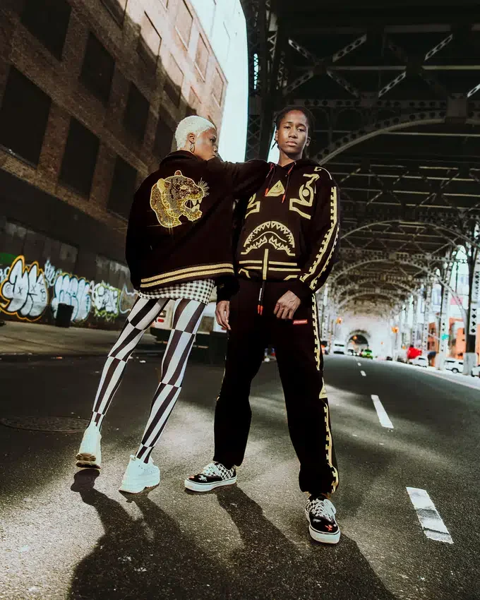A.I.9 AFRICAN INTELLIGENCE GUILDED LEOPARD - SANDFLOWER COLLAB VARSITY CEKET